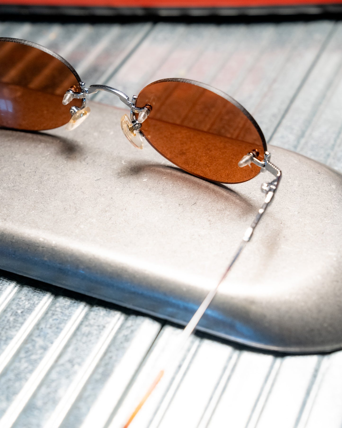 1990s Romaine Rimless Oval Copper Lens Sunglasses
