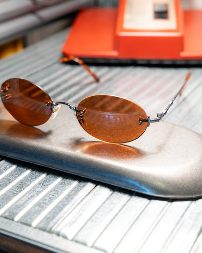 1990s Romaine Rimless Oval Copper Lens Sunglasses