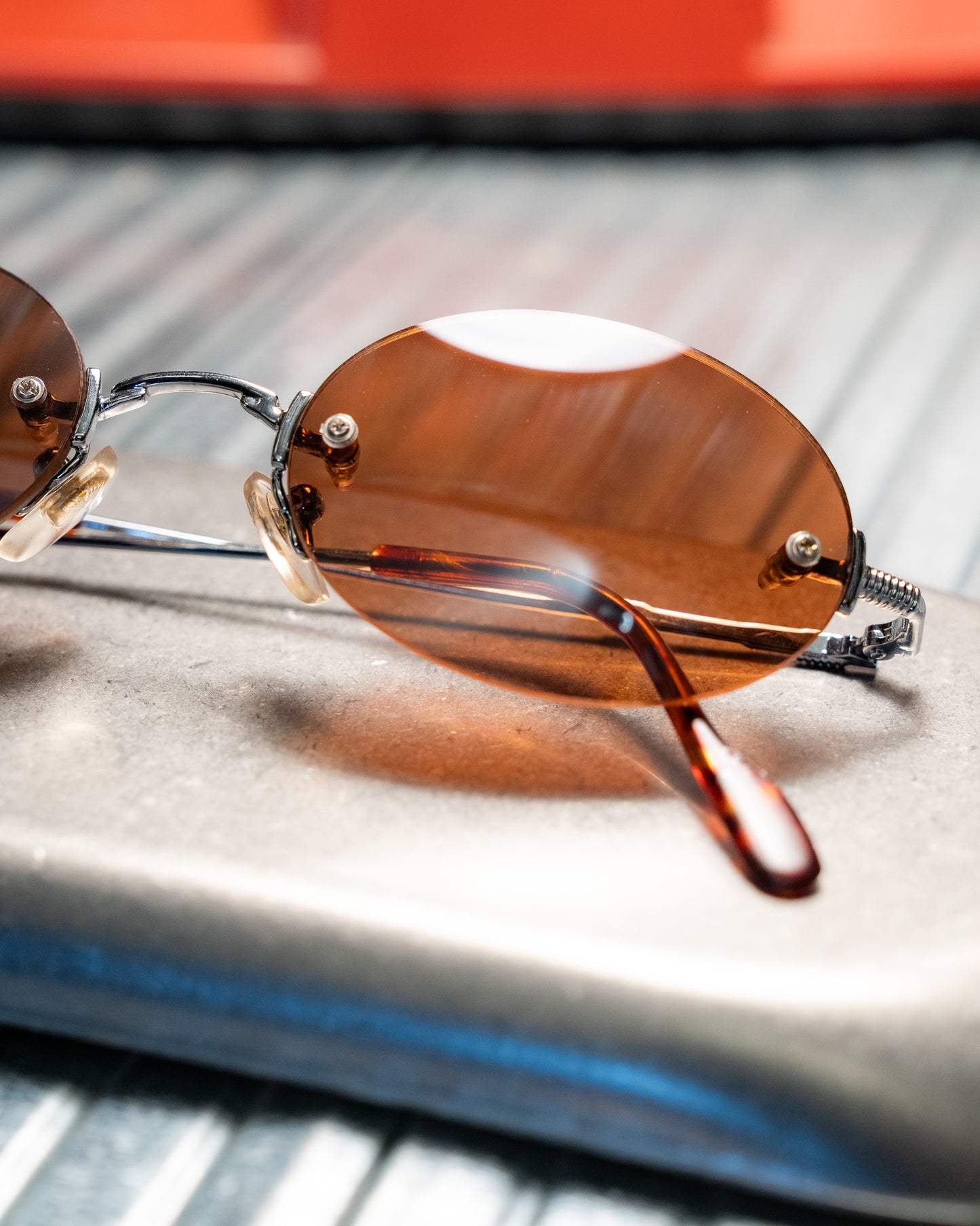 1990s Romaine Rimless Oval Copper Lens Sunglasses